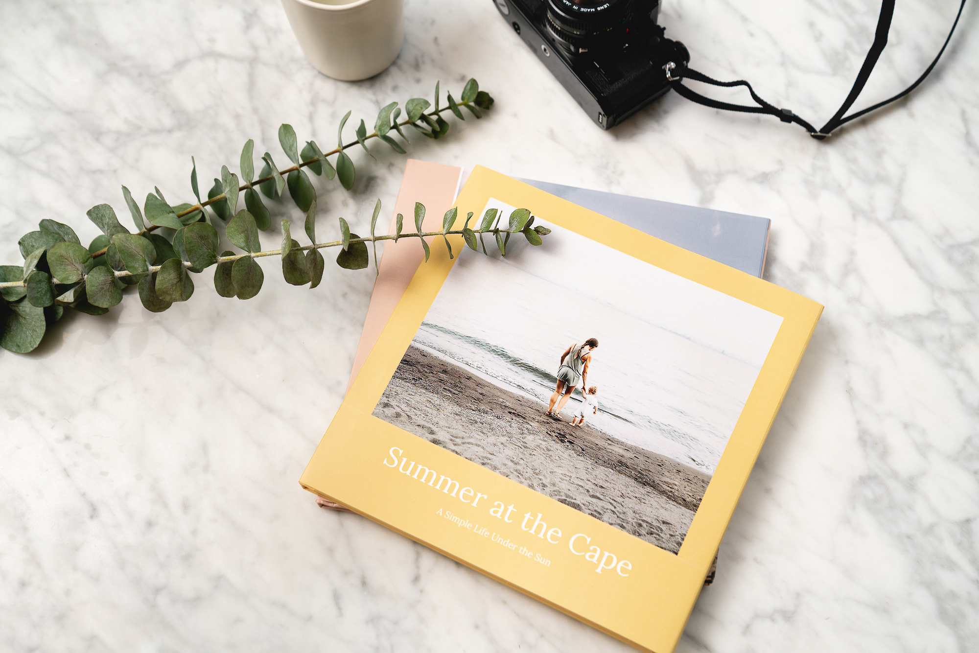 Mimeo Photos printed photobook on a desk