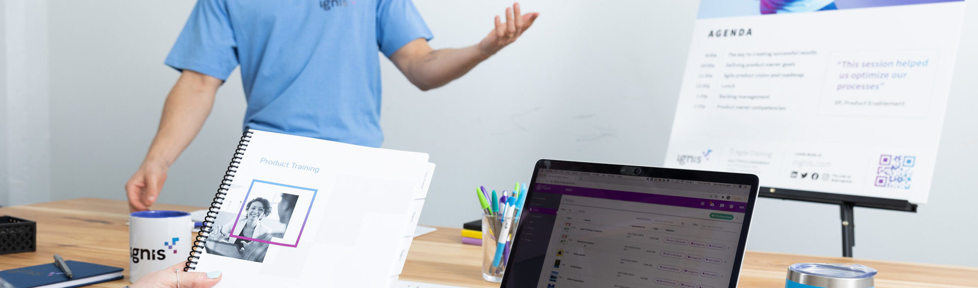 person holding training material during training session