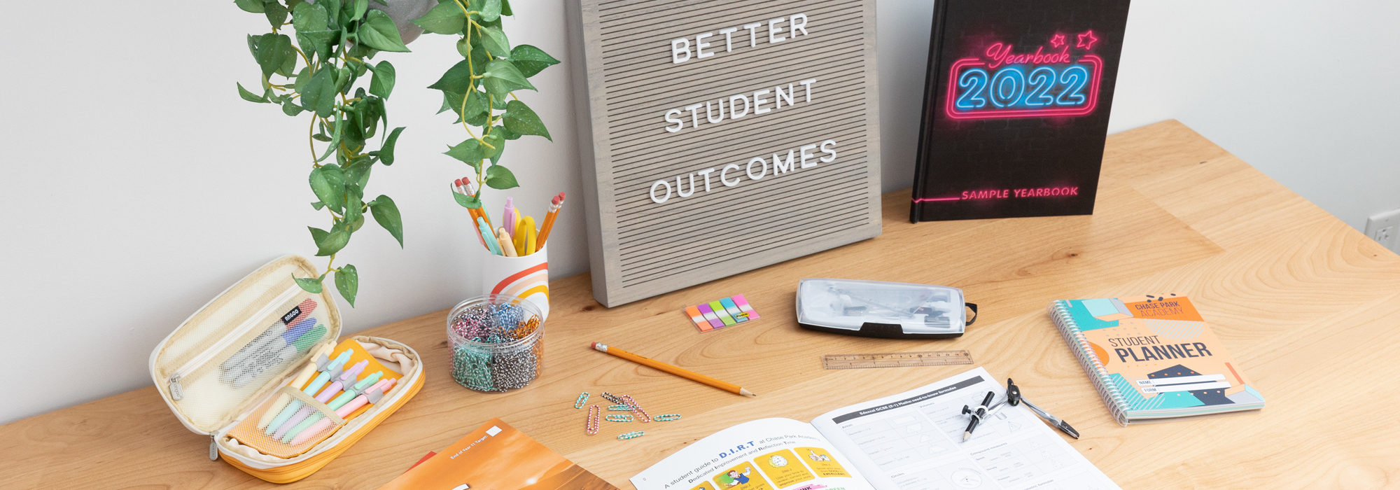 Assorted printed school products on a desk