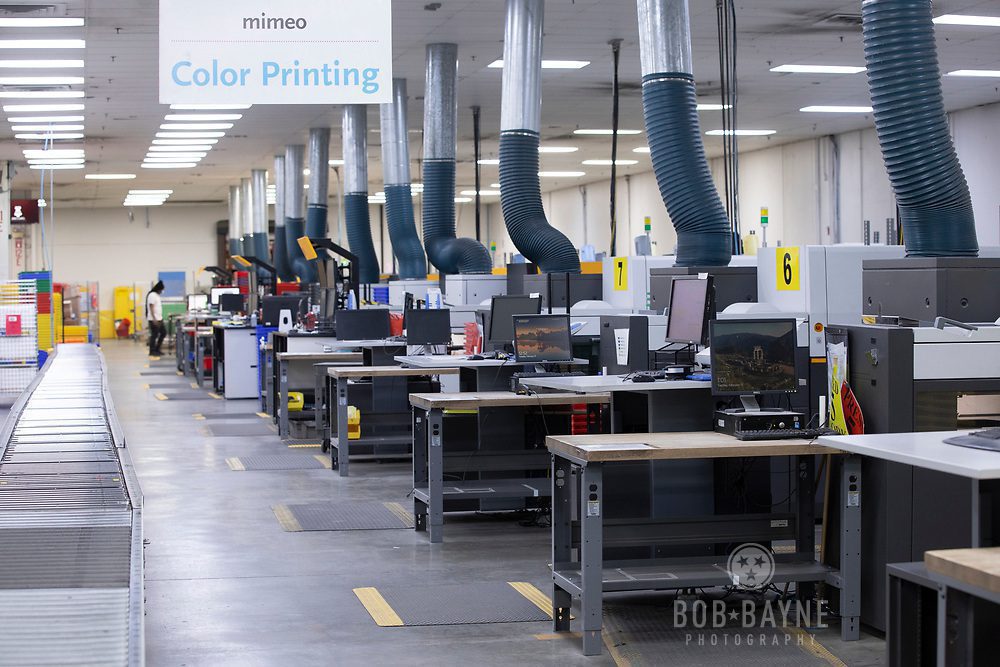 Printing warehouse with a row of printers
