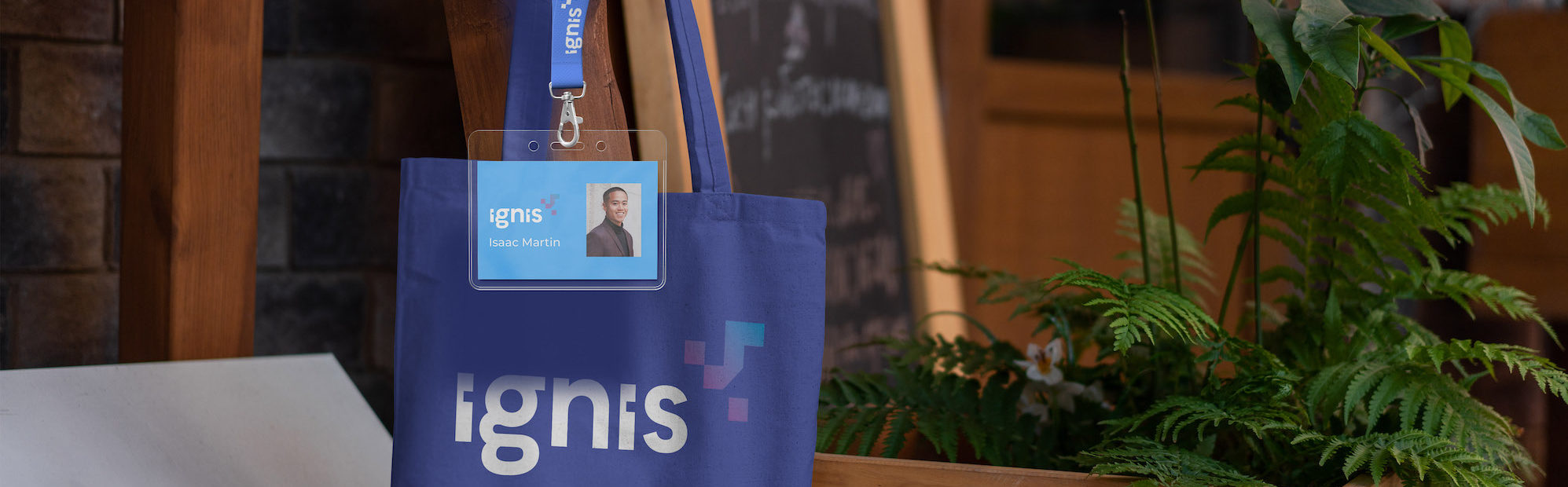 lanyard and tote bag hanging outside a store