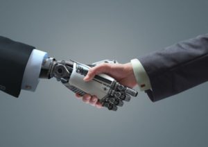 Man and Robot Shaking Hands