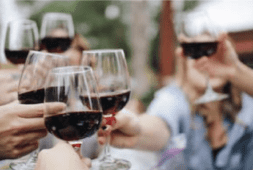 People Having a Toast with Wine Glasses