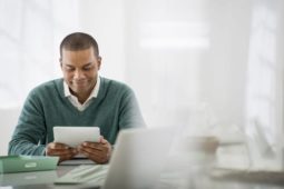 man engaging in digital training content