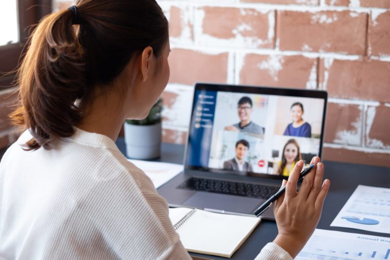 woman attending virtual video conference
