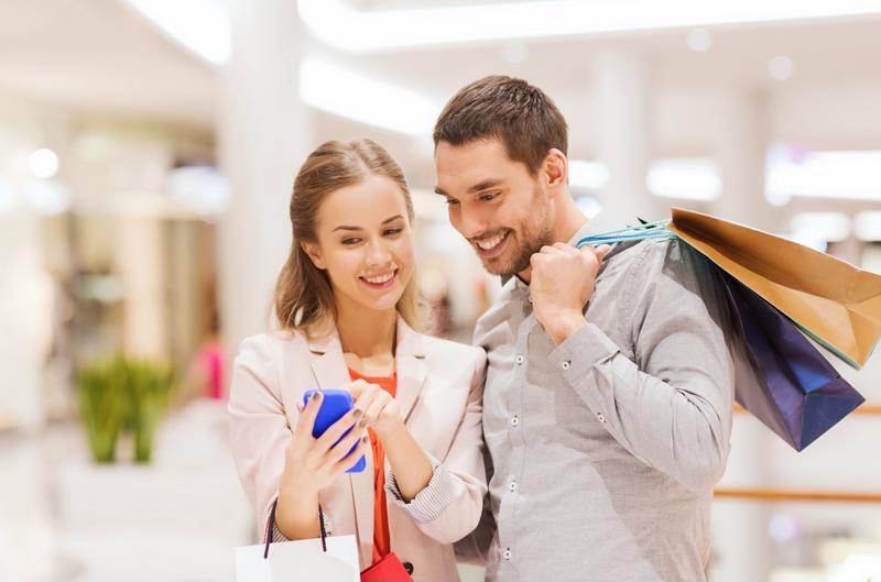 Couple looking at a smartphone