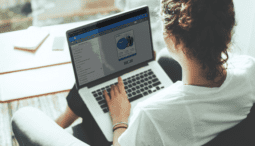 woman on computer using mimeo and time management tips