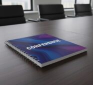 Conference booklet printing on a conference table