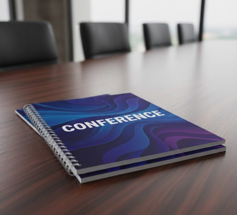 Conference booklet printing on a conference table