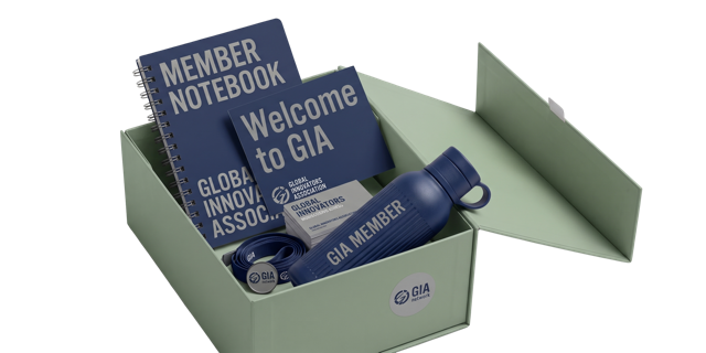 A new member association welcome kit with a postcard, water bottle, and notebook
