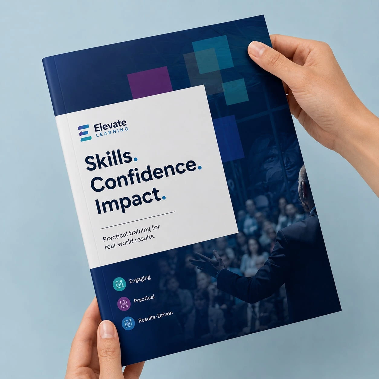 Hands holding a printed training booklet